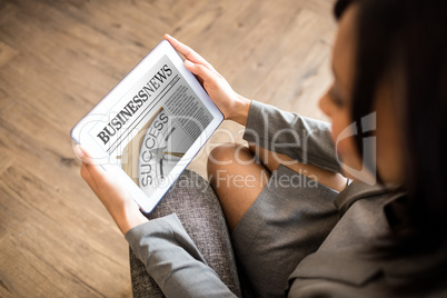 Composite image of business newspaper