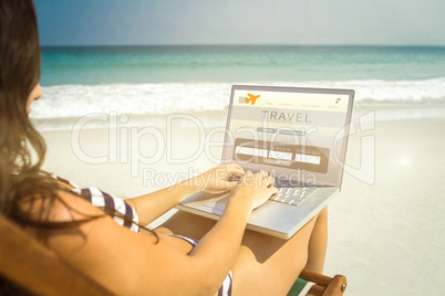 Composite image of pretty brunette using laptop on deck chair
