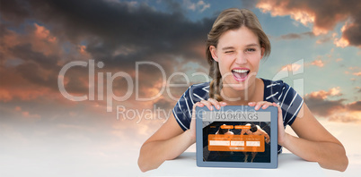 Composite image of woman showing tablet pc