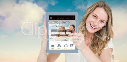 Composite image of woman showing tablet pc