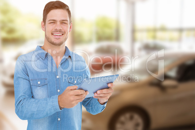Composite image of man holding digital tablet over white backgro
