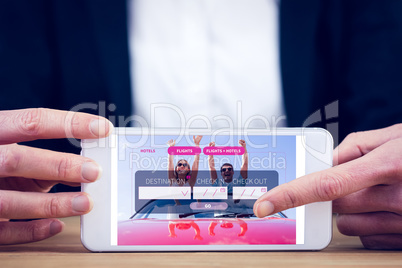 Composite image of businesswoman using her tablet pc