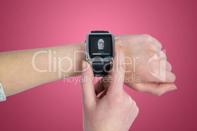 Composite image of woman using smartwatch