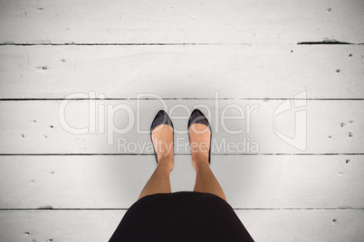 Composite image of businesswomans feet