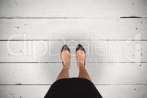 Composite image of businesswomans feet