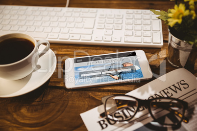 Composite image of smartphone on table