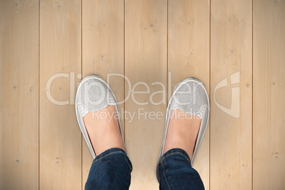 Composite image of casually dressed womans feet