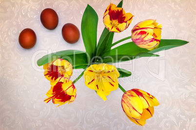 Bouquet yellow tulips and Easter eggs.