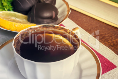 Still life : a Cup of black coffee on the table