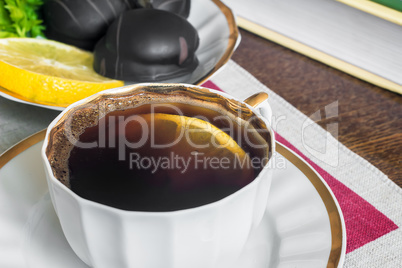 Still life : a Cup of black coffee on the table.