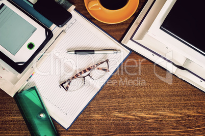 Book, notebook, glasses on your desktop.