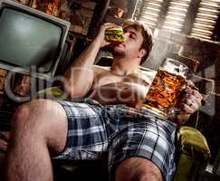 fat man eating hamburger