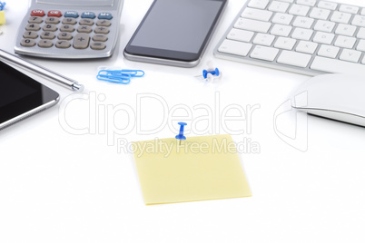 Office table with notebook, computer keyboard and mouse, tablet