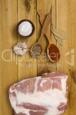 Spices in wooden spoons for cooking meat