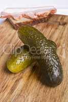 Pickled cucumbers on a cutting board