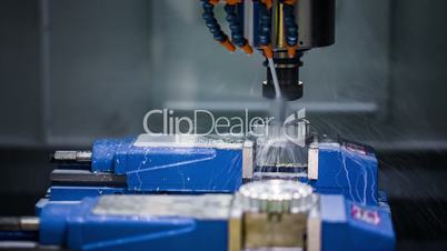 Metalworking CNC milling machine. Cutting metal modern processing technology.