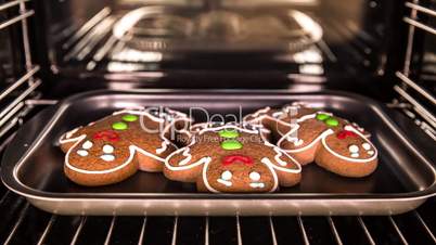 Baking Gingerbread man in the oven. Cooking in the oven.