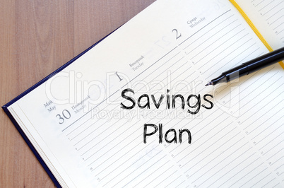 Savings plan write on notebook