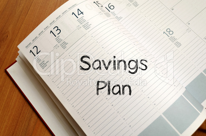 Savings plan write on notebook