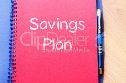 Savings plan write on notebook