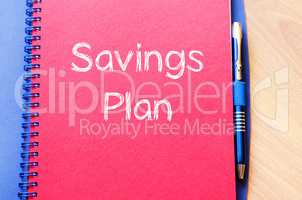 Savings plan write on notebook