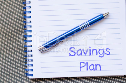 Savings plan write on notebook