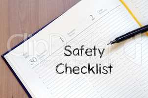 Safety checklist write on notebook