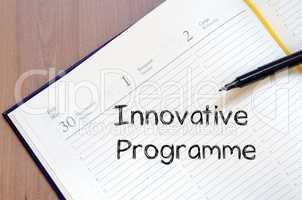 Innovative programme write on notebook