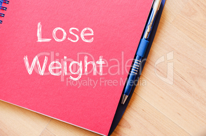 Lose weight write on notebook