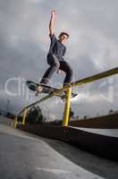 Skateboarder doing a board slide