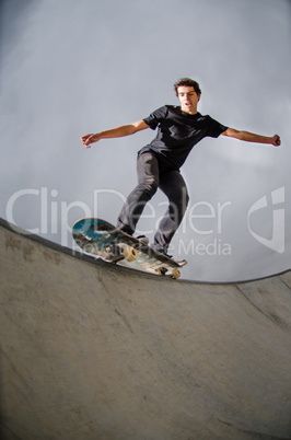 Skateboarder doing a grind