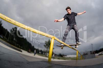 Skateboarder doing a board slide