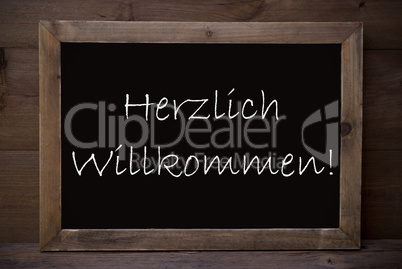 Chalkboard With Herzlich Willkommen Means Welcome