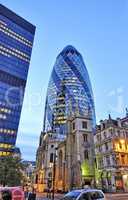 The modern glass buildings of the Swiss Re Gherkin