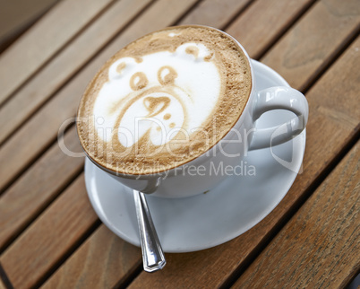 Teddy bear latte art coffee cup