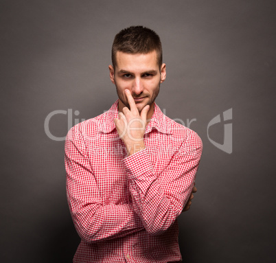 Thoughtful man in studio