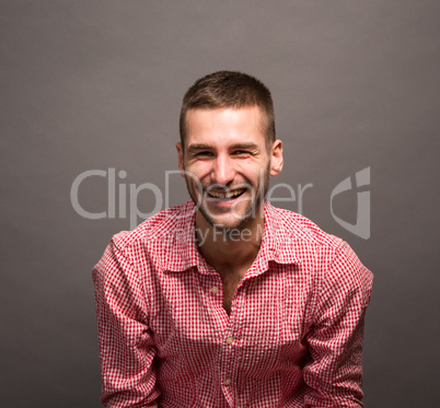 Smiling model man in studio