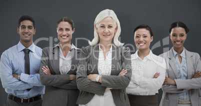 Composite image of business people with arms crossed smiling at
