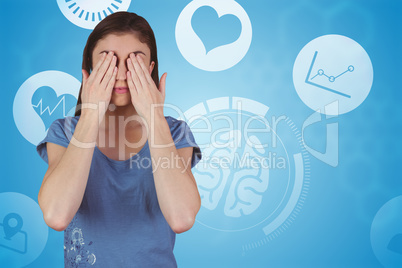 Composite image of pretty brunette with hands over eyes
