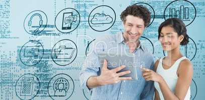 Composite image of smiling business people using digital tablet
