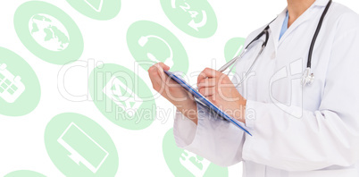 Composite image of doctor writing on clipboard