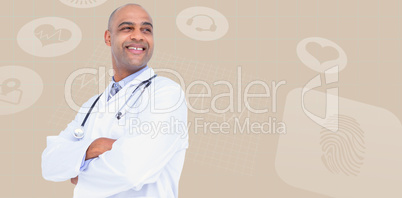 Composite image of smiling male doctor standing arms crossed