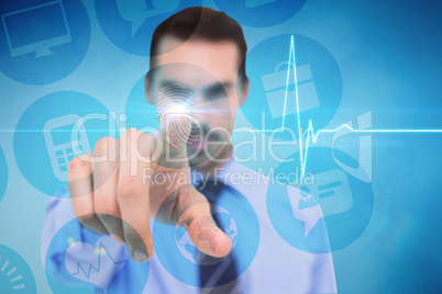 Composite image of businessman pointing his finger at camera