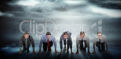 Composite image of business people ready to start race