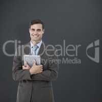Composite image of portrait of smiling businessman holding digit
