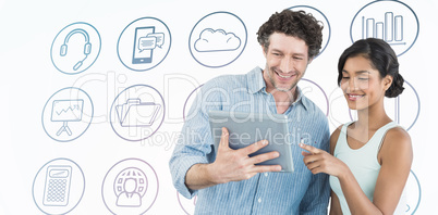 Composite image of smiling business people using digital tablet