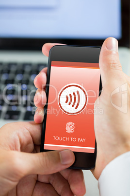 Composite image of man holding smartphone Composite image of man holding smartphone