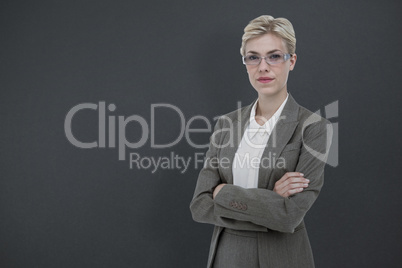 Composite image of businesswoman smiling on a white background