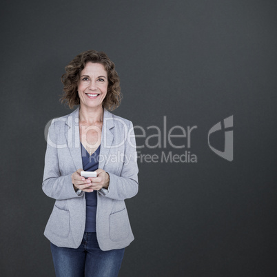 Composite image of portrait of smiling businesswoman using mobil