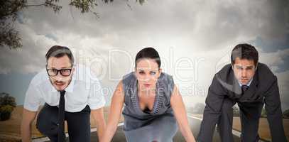 Composite image of business people ready to start race